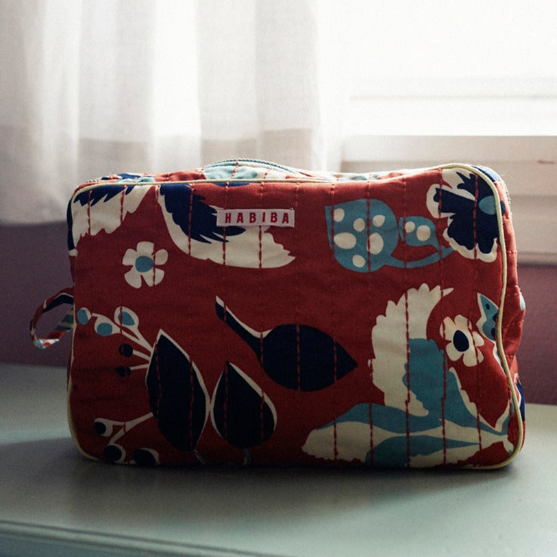 habiba makeup taske i rust farve med print